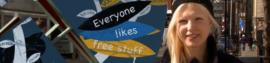 Visa Loyalty Programme, "Everyone likes free stuff", a loyalty voucher graphic over a real street photograph, from the archive page's own hero image