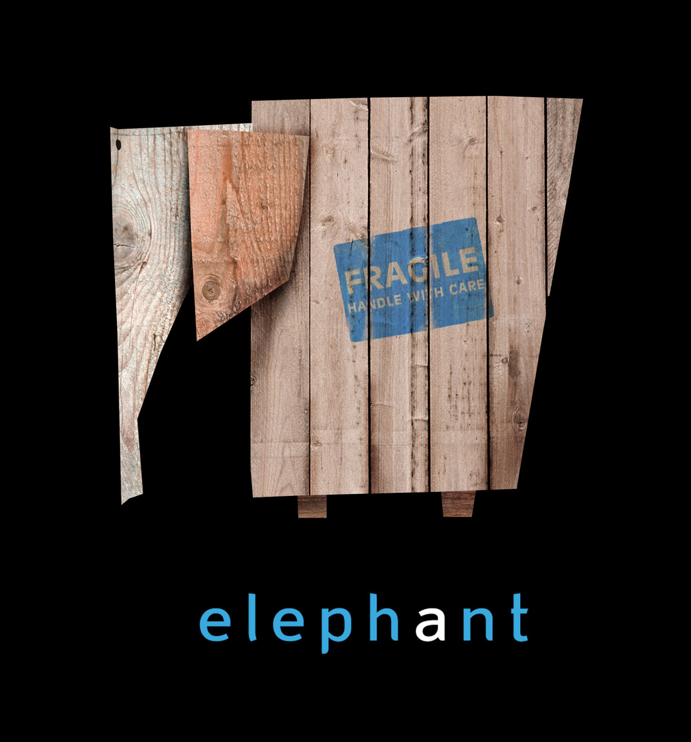 Wooden character design of an elephant, built from a reclaimed wooden shipping crate with a visible "FRAGILE" stamp
